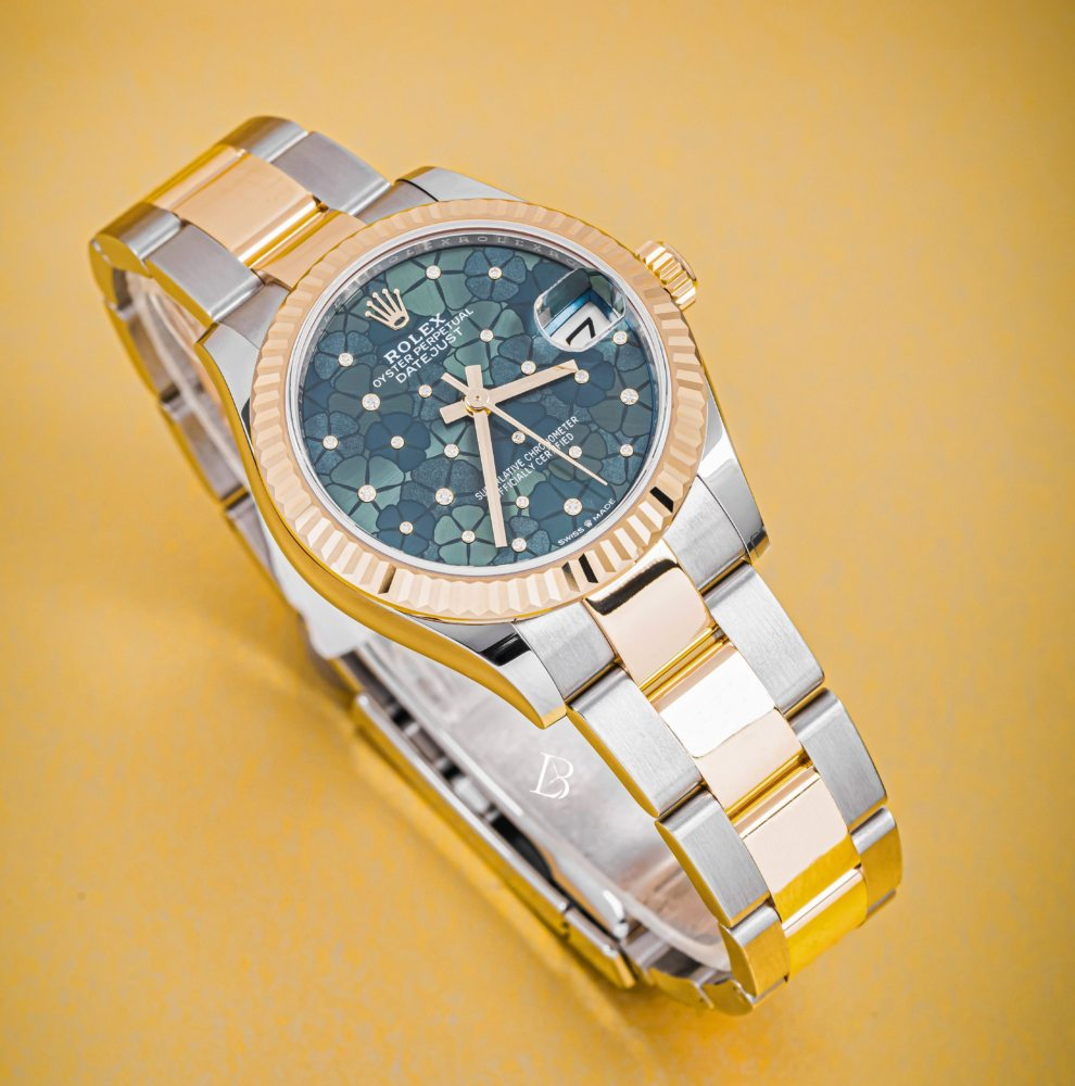 Rolex DJ31 with floral motif diamond dial